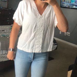 Medium causal white blouse but fits like a small